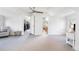 Bright bedroom featuring an en suite bathroom and spacious walk-in closet at 623 S Logan St, Denver, CO 80209