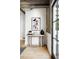Stylish entryway featuring wooden floors, modern art, and decorative elements at 623 S Logan St, Denver, CO 80209