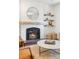 Close up of a cozy fireplace featuring a modern hearth at 623 S Logan St, Denver, CO 80209