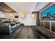 Private theater room with plush seating and large screen for the ultimate movie experience at 5672 S Nome St, Englewood, CO 80111