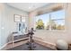Functional exercise room with view, perfect for maintaining an active lifestyle at home at 451 Interlocken Blvd # 101, Broomfield, CO 80021