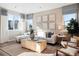 Cozy living room with stylish decor, comfortable seating, and lots of natural light at 451 Interlocken Blvd # 101, Broomfield, CO 80021