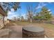 Spacious backyard with a hot tub, patio, and wood fence perfect for outdoor relaxation and entertaining at 80 S 38Th St, Boulder, CO 80305
