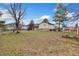 Spacious backyard with garden beds, lawn, and scenic mountain view at 80 S 38Th St, Boulder, CO 80305