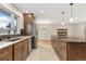 Bright kitchen featuring stainless steel appliances, granite countertops, and an open layout to the living area at 80 S 38Th St, Boulder, CO 80305