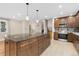 Spacious kitchen with wooden cabinets, stainless steel appliances, and granite countertop island at 80 S 38Th St, Boulder, CO 80305
