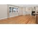Bright living room features hardwood floors, large window, and neutral paint at 80 S 38Th St, Boulder, CO 80305