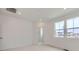 Spacious bedroom with large windows offering plenty of natural light at 6579 Parterre N Pkwy # 2, Thornton, CO 80602