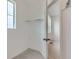 Walk-in closet has carpet, a clothing bar and a window for natural light at 6579 Parterre N Pkwy # 2, Thornton, CO 80602