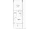 Layout of the main floor featuring a 2-bay garage, kitchen, powder room, and spacious great room with patio access at 6579 Parterre N Pkwy # 2, Thornton, CO 80602