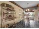 Casual dining room with unique stone floor and decorative border at 6832 S Birch Way, Centennial, CO 80122