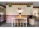 Inviting eat-in kitchen area featuring light walls, stone tile floors and natural light at 6832 S Birch Way, Centennial, CO 80122