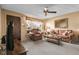 Living room with neutral colors, carpet and a window for great natural light at 6832 S Birch Way, Centennial, CO 80122