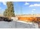 Backyard with storage shed and snow-covered ground at 19573 E Linvale Dr, Aurora, CO 80013