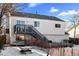 Home exterior showcasing a deck and backyard at 19573 E Linvale Dr, Aurora, CO 80013