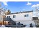 Home exterior showcasing a deck and backyard at 19573 E Linvale Dr, Aurora, CO 80013