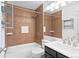 Bathroom with shower/tub combo and dark vanity at 19573 E Linvale Dr, Aurora, CO 80013