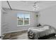 Bright bedroom with a double bed and ceiling fan at 19573 E Linvale Dr, Aurora, CO 80013