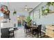 Dining area with access to the kitchen and back deck at 19573 E Linvale Dr, Aurora, CO 80013