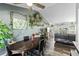 Elegant dining area with dark wood table and chairs at 19573 E Linvale Dr, Aurora, CO 80013