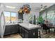 Kitchen features an island, stainless steel appliances, and a view at 19573 E Linvale Dr, Aurora, CO 80013