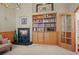 Charming office nook featuring a fireplace, built-in shelving, and classic finishings at 4 Prairie Falcon Ln, Littleton, CO 80127