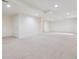 Large basement area features recessed lighting, neutral carpet, and a finished room at 4016 S Rome St, Aurora, CO 80018