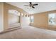 Bedroom featuring vaulted ceilings, ceiling fan, and ample natural light at 4016 S Rome St, Aurora, CO 80018
