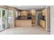 Modern kitchen with stainless steel appliances and wood cabinets at 4016 S Rome St, Aurora, CO 80018
