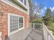 Spacious outdoor deck with white railings offering views of the yard and surrounding greenery at 6505 S Garfield Ct, Centennial, CO 80121