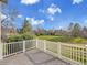 Back deck overlooking a manicured lawn, providing a serene outdoor living space at 6505 S Garfield Ct, Centennial, CO 80121