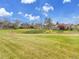 Lush green backyard showcasing mature trees and landscaping in a peaceful setting at 6505 S Garfield Ct, Centennial, CO 80121