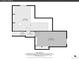 Basement floorplan showing a spacious storage area and a bedroom measuring 22'7