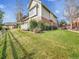 Charming home exterior with well-maintained lawn and mature landscaping on a sunny day at 6505 S Garfield Ct, Centennial, CO 80121