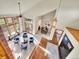 Sun-filled living room features vaulted ceilings, fireplace, and beautiful windows offering ample natural light at 6505 S Garfield Ct, Centennial, CO 80121