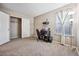 Home office or bedroom with closet and window at 11590 River Oaks Ln, Commerce City, CO 80640