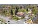 Aerial view showcasing the building nestled within a vibrant park setting at 2944 Hooker St, Denver, CO 80211