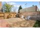 Backyard retreat with gravel, lawn, and a wooden fence, perfect for relaxation at 2944 Hooker St, Denver, CO 80211