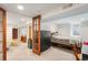 Finished basement area with carpeting, a bed, and space for relaxing at 2944 Hooker St, Denver, CO 80211