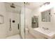 Modern bathroom featuring a glass-enclosed shower and stylish fixtures at 2944 Hooker St, Denver, CO 80211