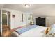 Bedroom showcasing hardwood floors and ample closet space at 2944 Hooker St, Denver, CO 80211