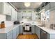 Well-designed kitchen featuring stainless steel appliances and custom cabinets at 2944 Hooker St, Denver, CO 80211