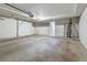 Unfinished basement with concrete floor and utility connections, ready for customization at 999 N Emerson St # 10, Denver, CO 80218
