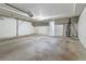 Spacious unfinished basement with concrete floors, white walls, and utility connections, offering potential for customization at 999 N Emerson St # 10, Denver, CO 80218