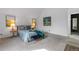 Bright, modern bedroom features stylish artwork, comfortable linens, and ample natural light at 999 N Emerson St # 10, Denver, CO 80218