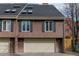 Charming exterior featuring a well-maintained facade with skylights, classic windows, and an attached garage at 999 N Emerson St # 10, Denver, CO 80218