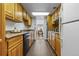 Efficient kitchen with modern appliances and plenty of cabinet space at 999 N Emerson St # 10, Denver, CO 80218