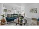 Cozy living room with bright decor, comfortable seating, and lots of natural light at 999 N Emerson St # 10, Denver, CO 80218