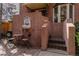 Charming patio with a fountain, wrought iron chairs, and a bistro table, creating a relaxing outdoor space at 999 N Emerson St # 10, Denver, CO 80218