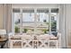 Cozy dining area with a view of the backyard and access to outdoor seating at 2008 Makley Loop, Castle Rock, CO 80104